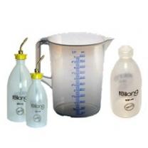 Measuring cups, oil and laboratory bottles